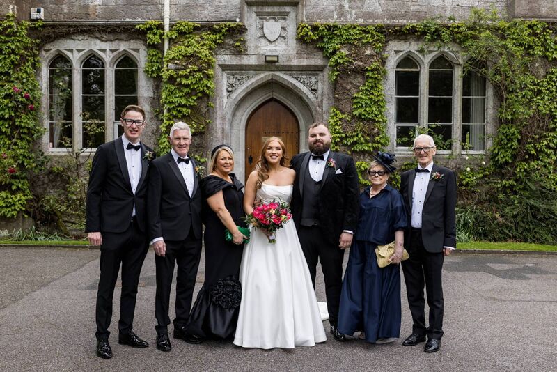 The couple pictured with Laura’s family: Freddie, Barry, June, Laura, James, Heather and Liam.