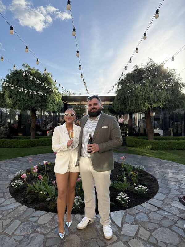 Laura and James at their rehearsal dinner at the Hayfield Manor where they got engaged.