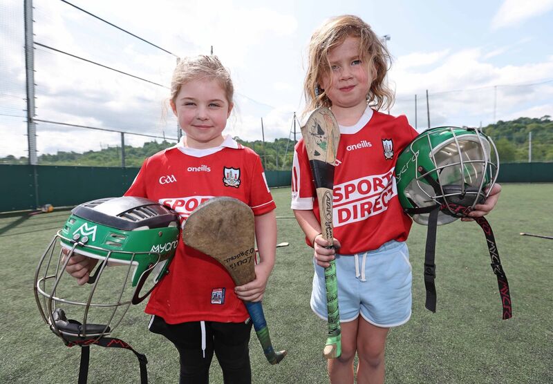  Emily Twomey and Sophie O'Shea, in their Cork Jerseys at Nemo Rangers Cúl Camp. Picture: Jim Coughlan.