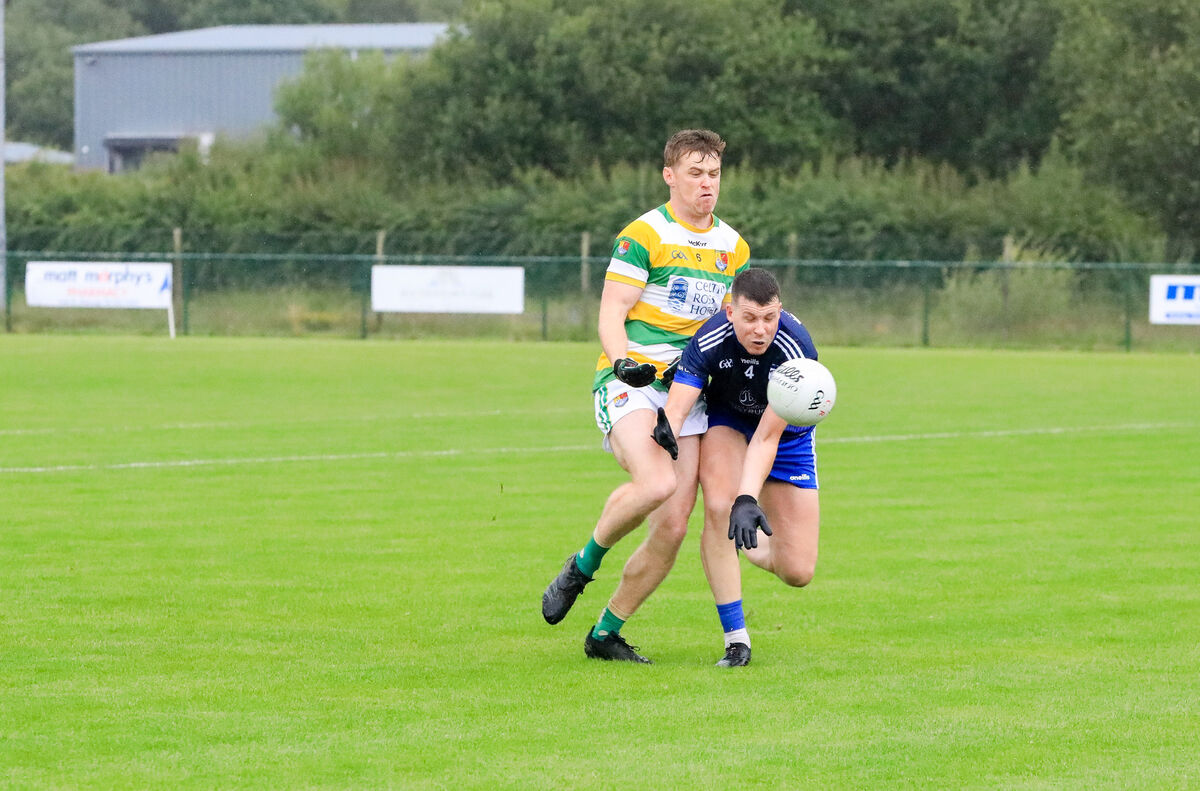 Knocknagree's Anthony O'Connor is tackled by Jerry O'Riordan of Carbery Rangers. Picture: David Creedon