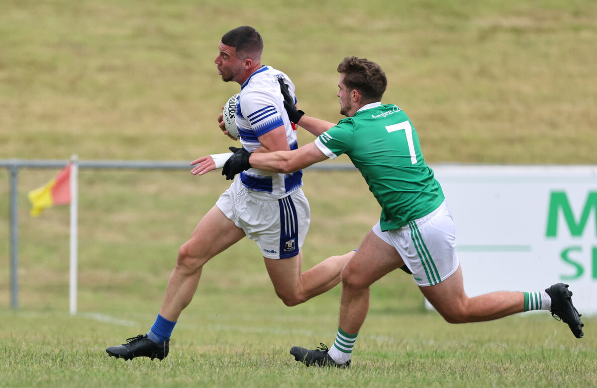  Troy O'Sullivan of Ballyphehane and Seán Motherway of Araglen battle for the ball. Picture: Jim Coughlan