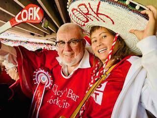 Cork fan Thu Van Nguyen pictured with Cork Superfan Cyril Kavanagh at Croke Park for the All-Ireland semi final against Dublin.