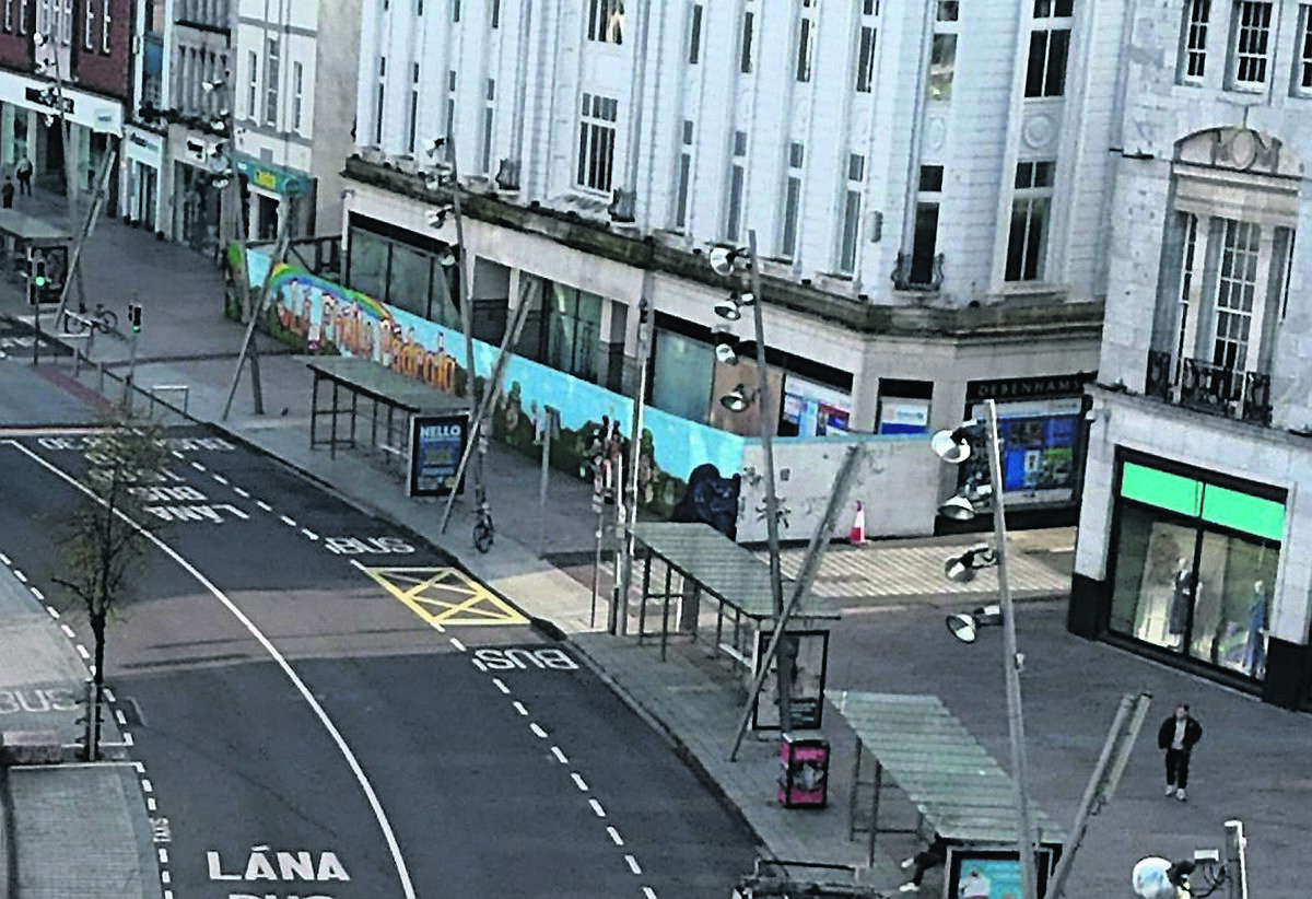 The hoarding around the front of the former Debenhams premises at Patrick Street.	Picture: Larry Cummins
                    