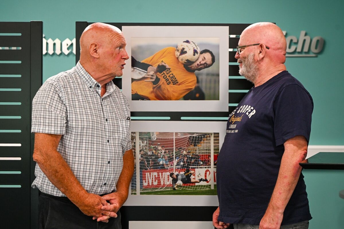 Retiring press photographer Eddie O’Hare chats with Echo sports writer Noel O’Sullivan in front of one of Eddie’s award-winning images, which earned first place in the Sports Action category at the PPAI Awards. The pair were at the match together and reminisced about old times during the event celebrating Eddie’s 47-year career. Picture Chani Anderson.