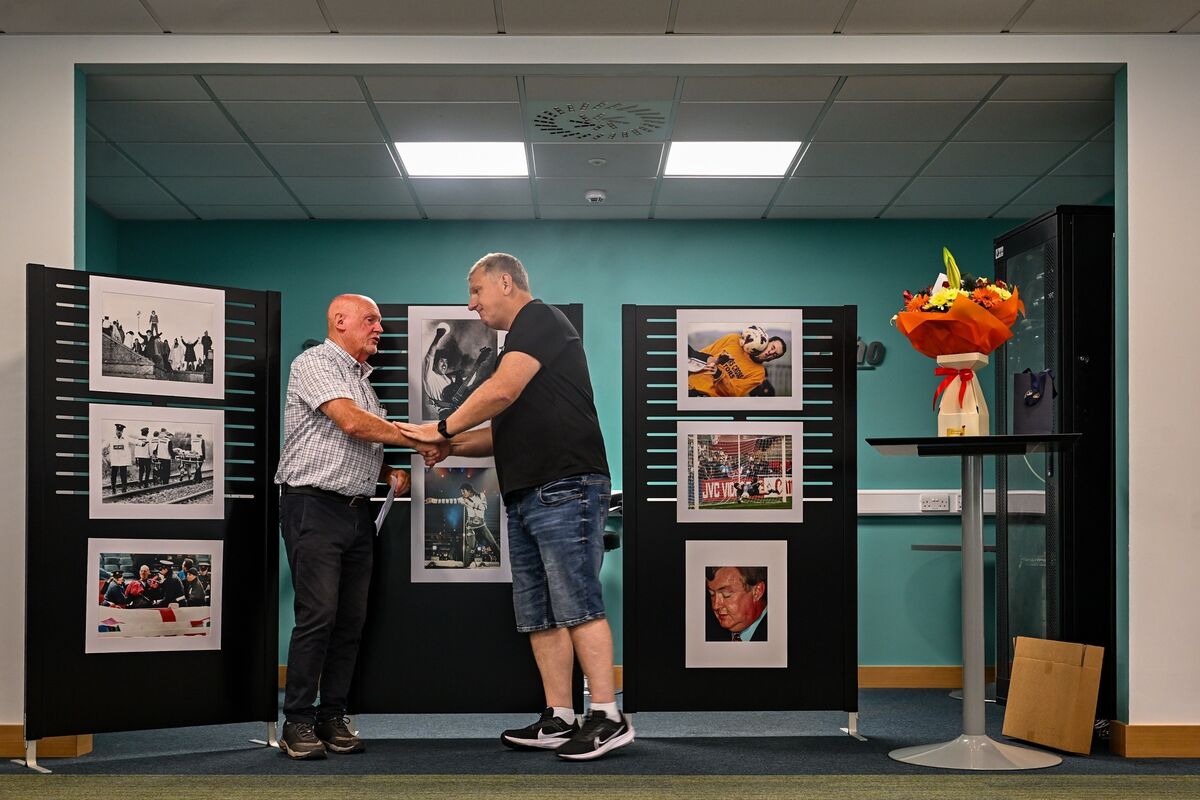 John McHale, sports editor of The Echo, shares stories and memories of his friend and colleague Eddie O’Hare during a celebration of Eddie’s retirement after 47 years documenting Cork sport and life. Picture Chani Anderson.