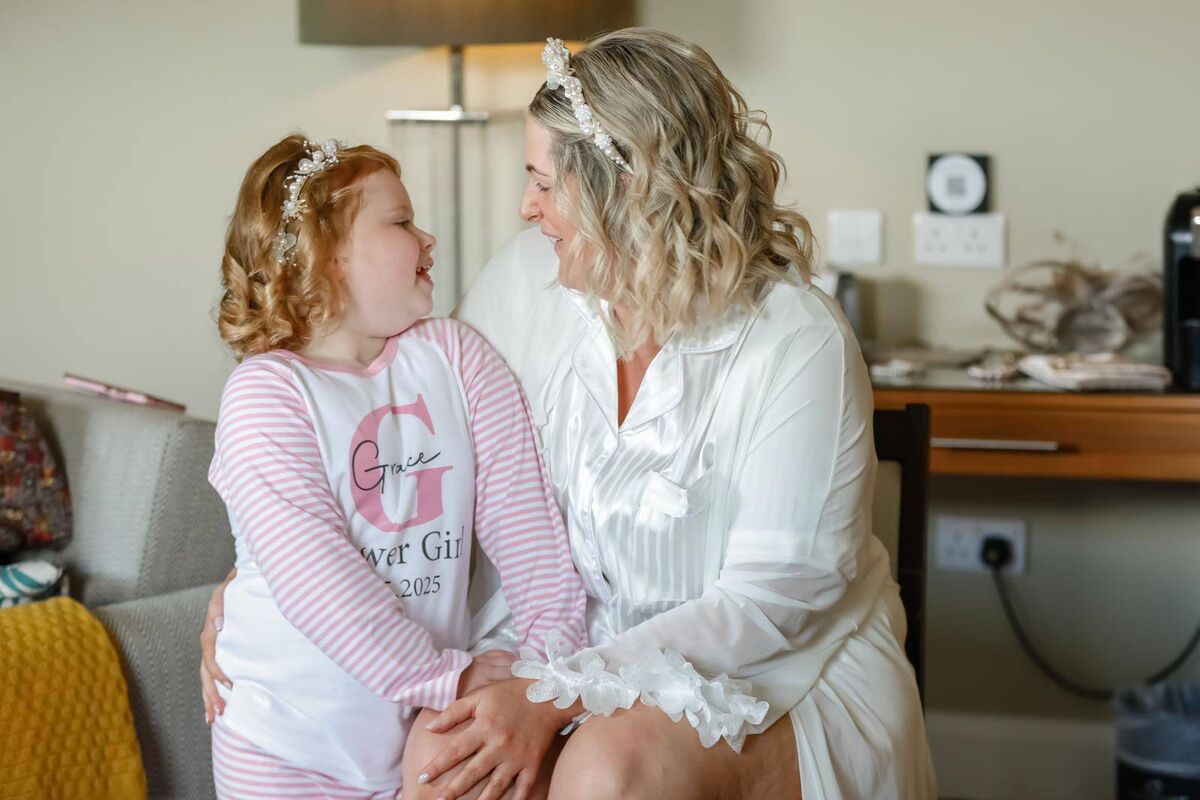 Alyssa with her daughter Grace before the ceremony. Alyssa with her daughter Grace before the ceremony.