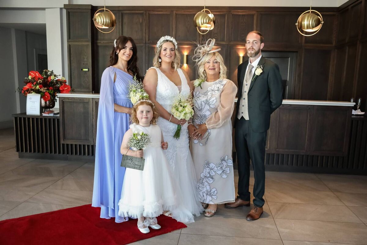 Alyssa pictured with her daughter Grace (front), siblings Emma and Mark, and mother-of-the-bride, Mary. Alyssa pictured with her daughter Grace (front), siblings Emma and Mark, and mother-of-the-bride, Mary.