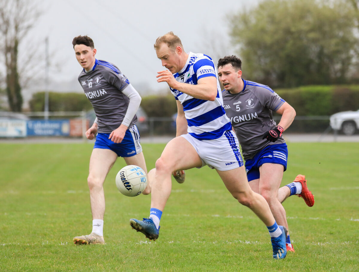 Castlehaven's Cathal Maguire is chased by Cill Na Martra players Jason Mac Cárthaigh and Ciarán Ó Fóirréidh. Picture: David Creedon
