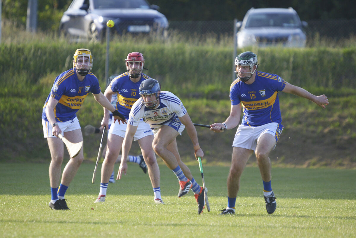 Killavullen's Charlie Lillis gets to the ball ahead of Patrick Crowley, Diarmuid Ó Mathúnas. Picture: Denis Boyle