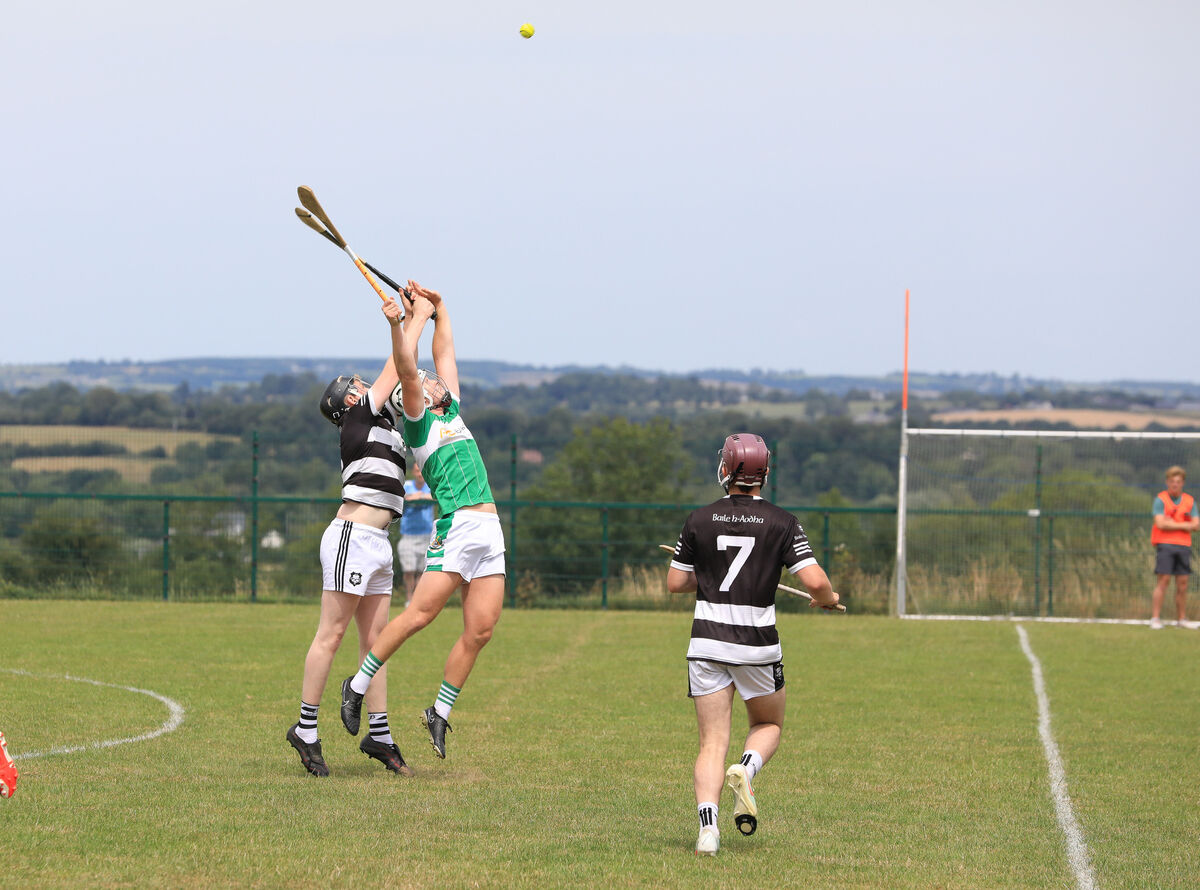 Aghabullogue's Padraic O'Sullivan and Ballyhea's Gavin Morrissey rise for the dropping ball. Picture: David Creedon