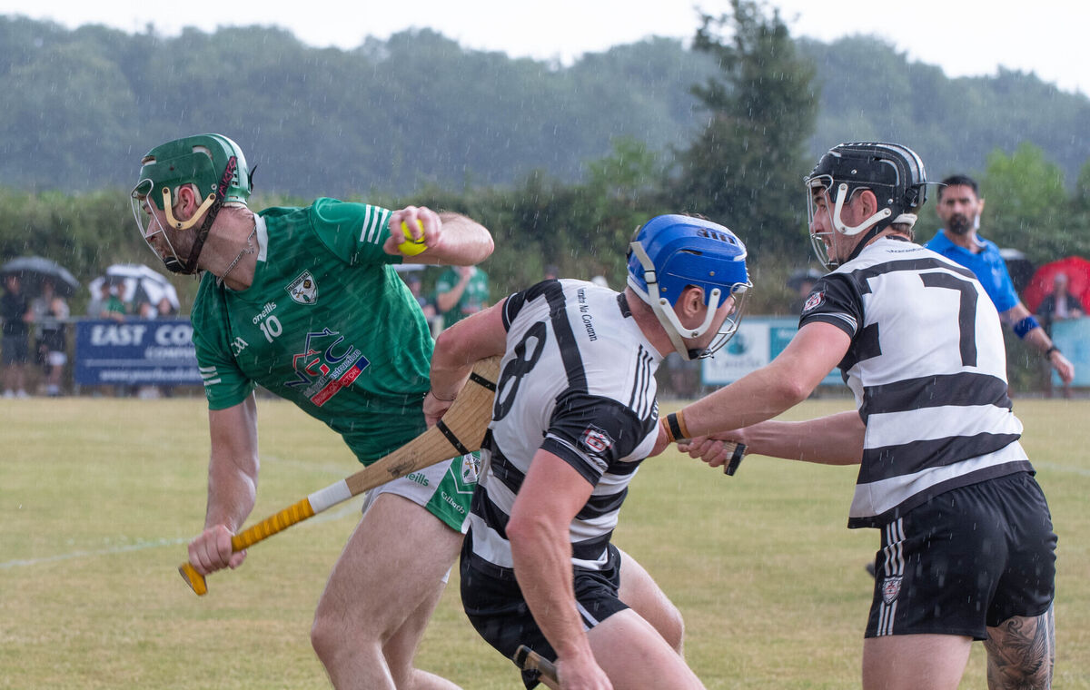 Killeagh's Ryan McCarthy breaks away from Sean O'Meara and Ross O'Regan of Midleton. Picture: Howard Crowdy Killeagh's Ryan McCarthy breaks away from Sean O'Meara and Ross O'Regan of Midleton. Picture: Howard Crowdy
