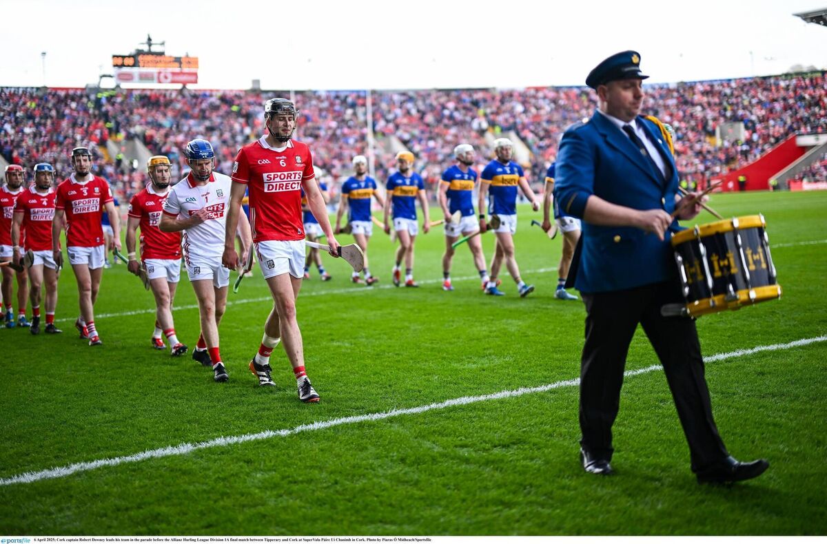Robert Downey leads the Cork team in the parade before the Allianz HL Division 1A final against Tipperary in April. Picture: Piaras Ó Mídheach/Sportsfile