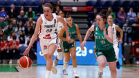 Pauline Astier runs down up the court with Annaliese Murphy 12/11/2023