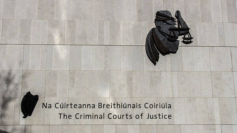 Armed burglar who threatened to stab homeowner is jailed
