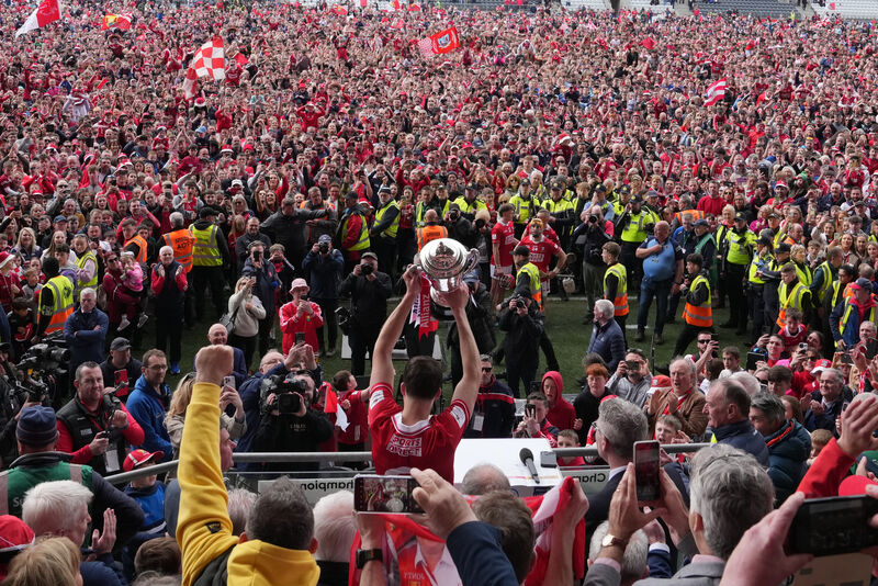 Cork captain Robert Downey lifts the trophy after the Allianz HL Division 1A final win over Tipperary in April. Picture: Inpho/James Lawlor