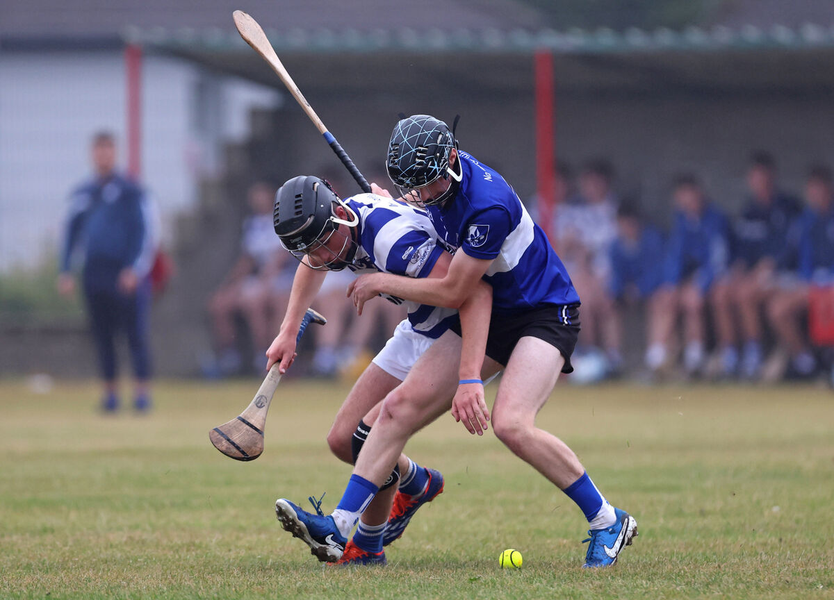 Michael Hurley, Sarsfields, and Jack O'Mahony, Inniscarra battle for possession. Picture: Jim Coughlan. Michael Hurley, Sarsfields, and Jack O'Mahony, Inniscarra battle for possession. Picture: Jim Coughlan.