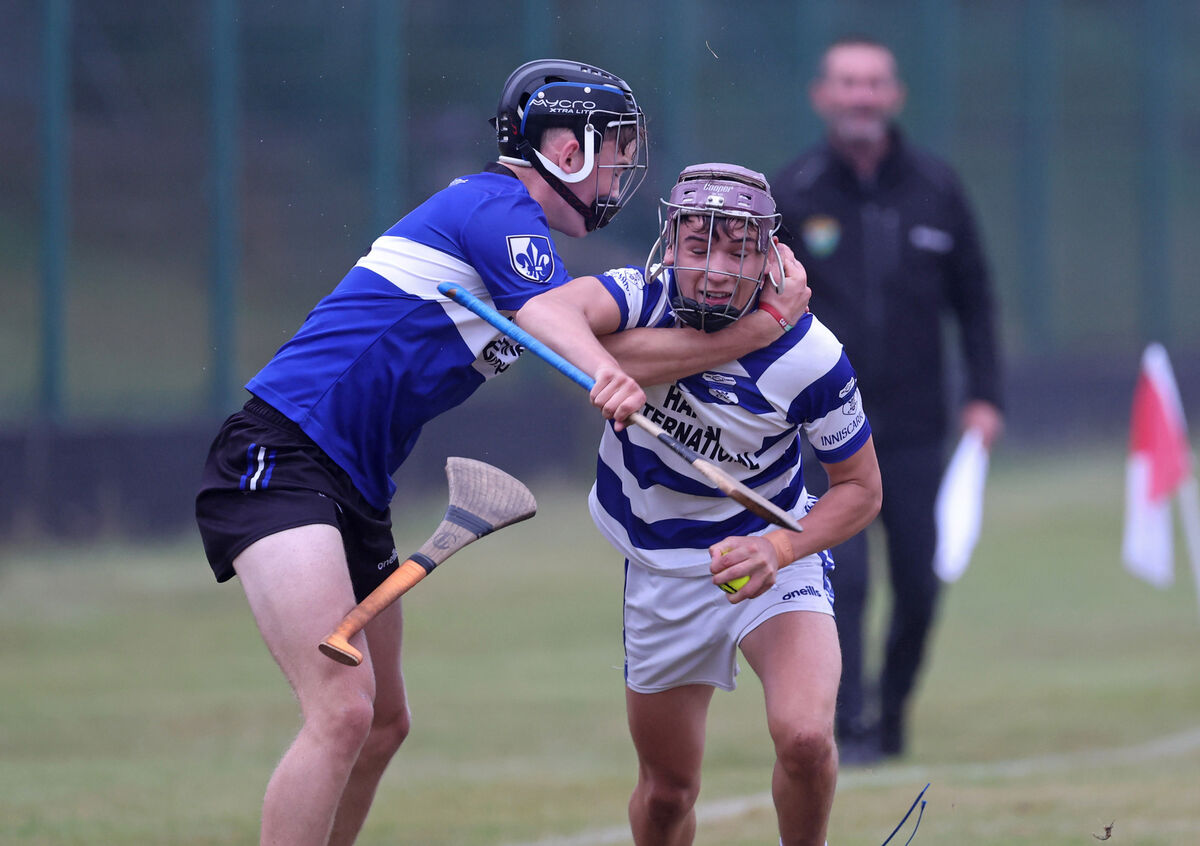 Kevin Murphy, Sarsfields, tackles Donagh Holland, Inniscarra. Picture: Jim Coughlan. Kevin Murphy, Sarsfields, tackles Donagh Holland, Inniscarra. Picture: Jim Coughlan.