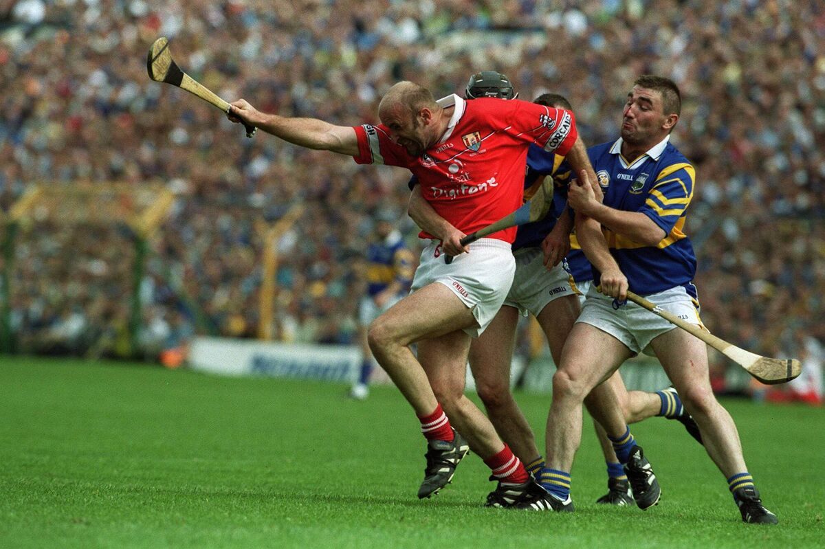 2000 Munster Final Cork vs Tipperary Brian Corcoran of Cork charges through the tackle of Paul Shelley of Tipperary. Picture: INPHO/Tom Honan 2000 Munster Final Cork vs Tipperary Brian Corcoran of Cork charges through the tackle of Paul Shelley of Tipperary. Picture: INPHO/Tom Honan