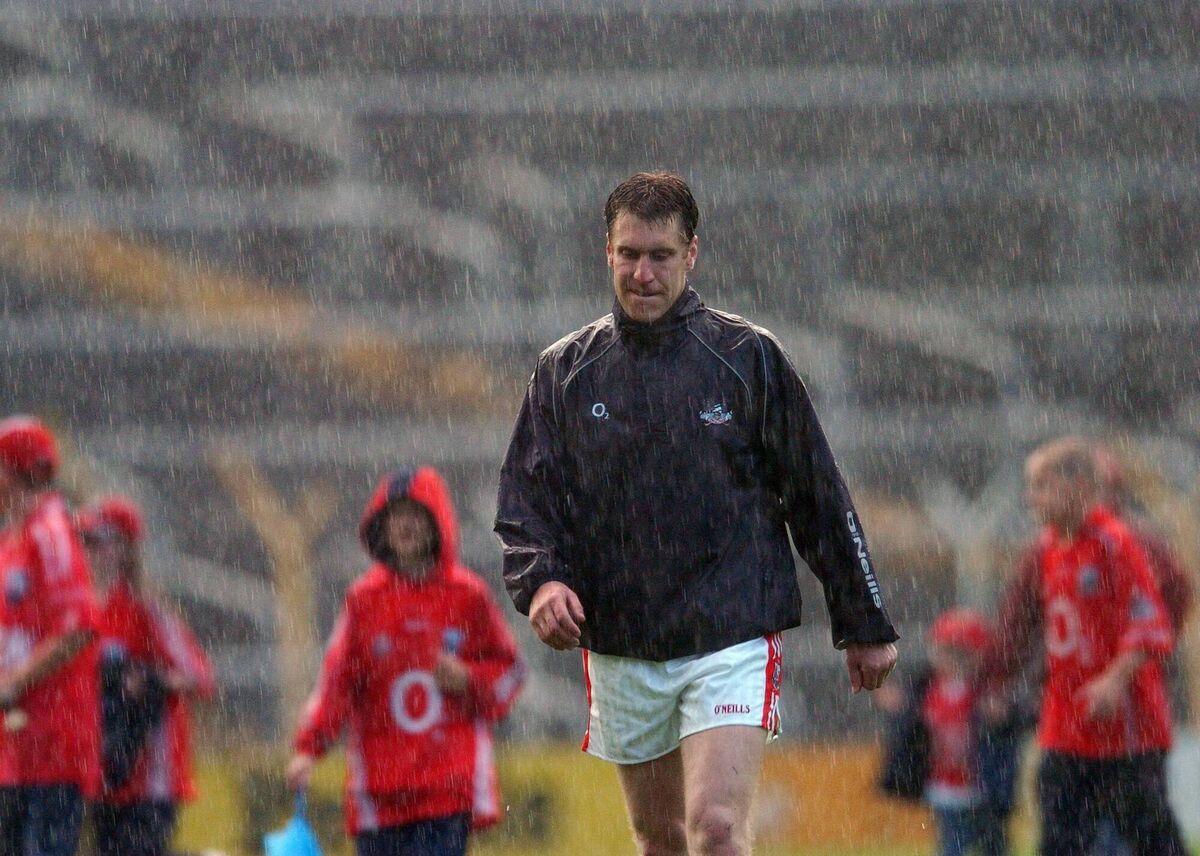 Disappointment for Cork forward Timmy McCarthy as he walks off in the rain after a 2007 loss to Tipp in Thurles. Picture: Des Barry Disappointment for Cork forward Timmy McCarthy as he walks off in the rain after a 2007 loss to Tipp in Thurles. Picture: Des Barry