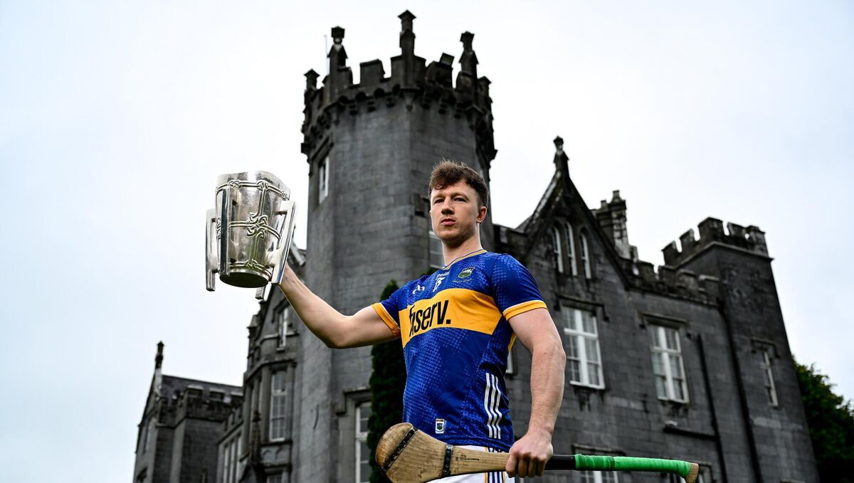 Jake Morris of Tipperary poses for a portrait with the Liam MacCarthy Cup. Picture: Brendan Moran/Sportsfile