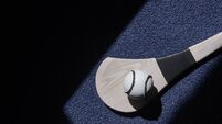 Hurling bat and sloitar on blue background. Horizontal sport theme poster, greeting cards, headers, website and app