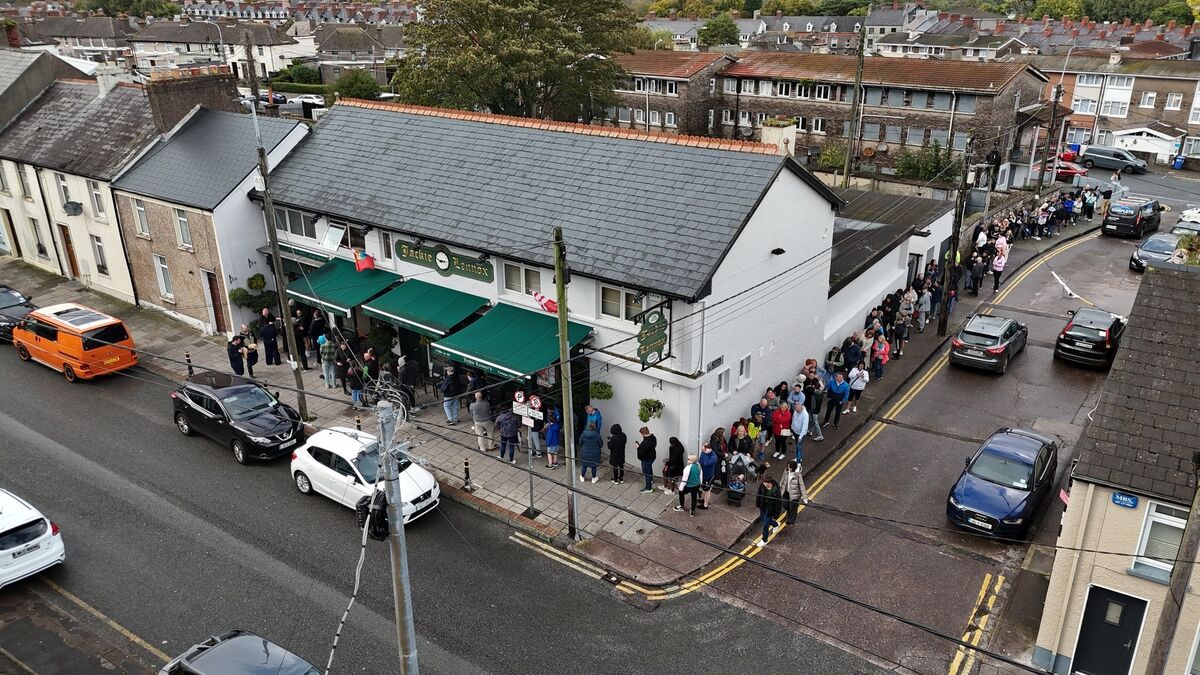  Customers queue for food at Jackie Lennox chip shop on Bandon Road on the last day of business at the iconic Cork fast food outlet on Sunday, Octiber 06, 2024. Pic: Larry Cummins