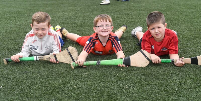  Adam Leonard, Alfie Dunlea and Corey Hussey, supporting Cork at the St Vincent's GAA club cul camp. Picture: David Keane.
