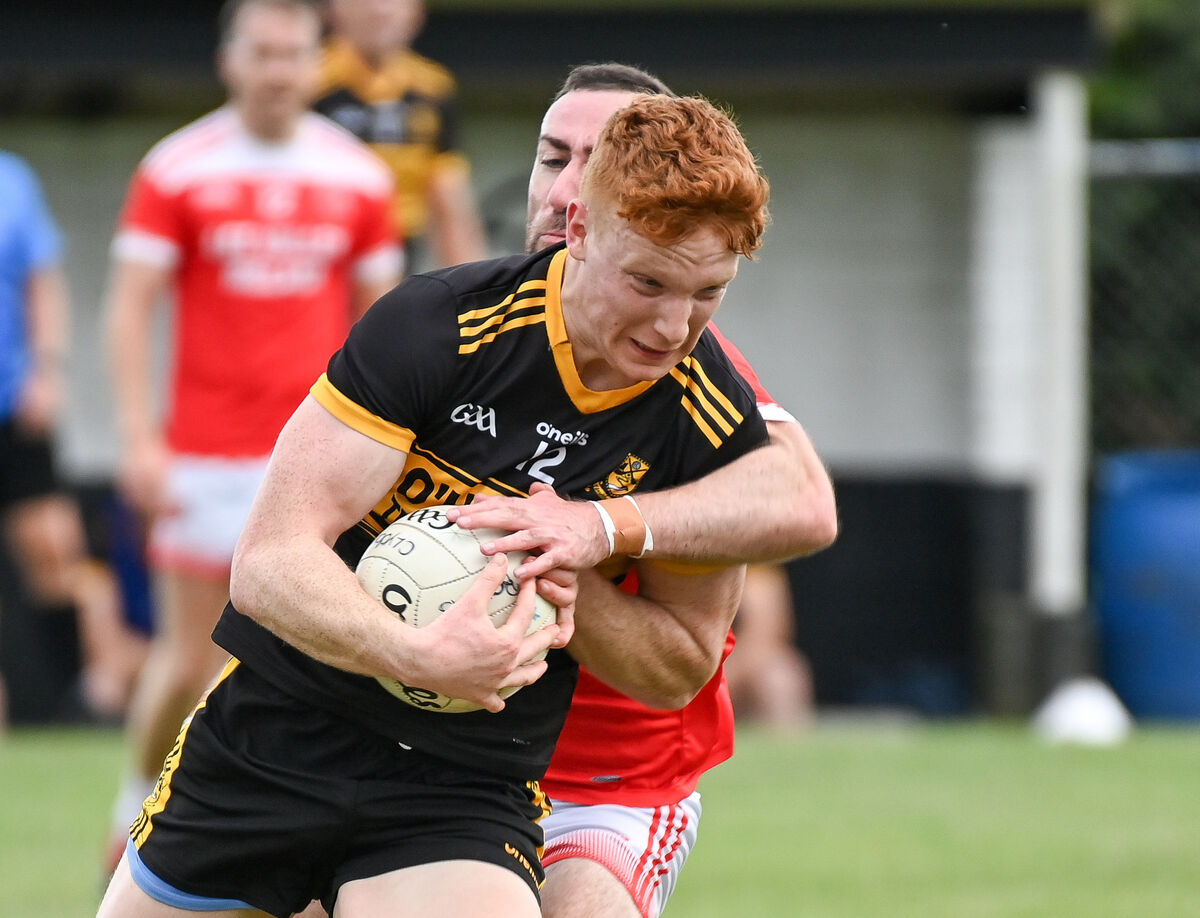  Clyda Rovers' Eoin Walsh is tackled by Iveleary's Brian Cronin during their Division 3 Football League final at Donoughmore. Picture: David Keane