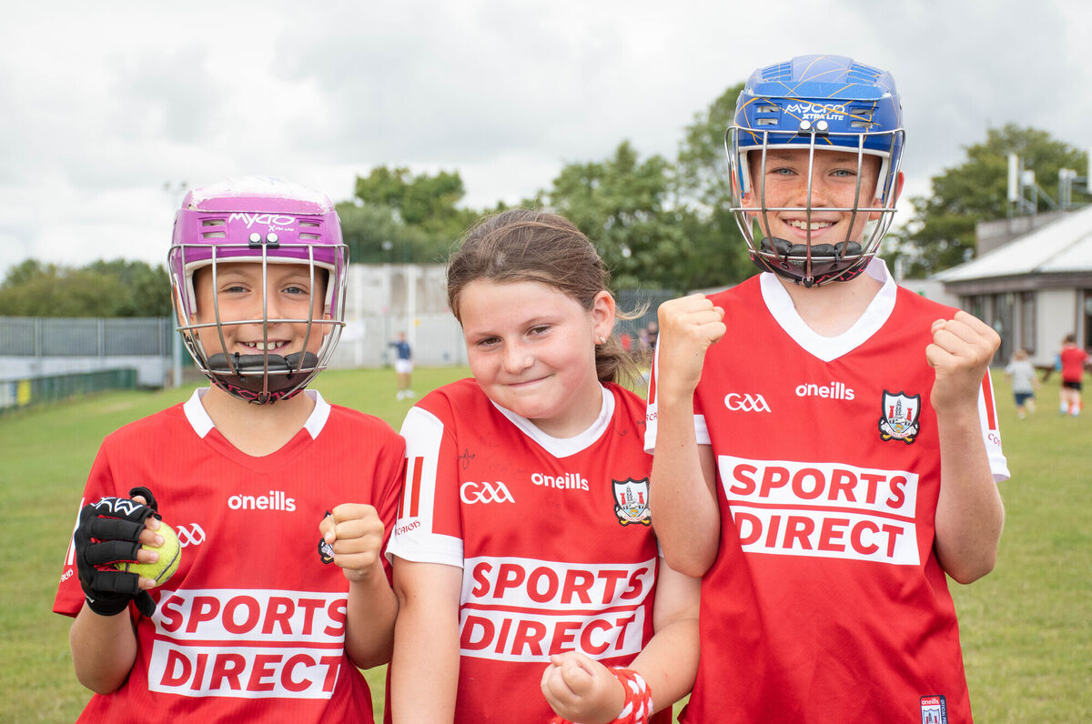Jack O'Byrne Looney, Emma Considine and Jack Casey showing their support for Cork at the St Finbarr's GAA Street Leagues. Picture: Howard Crowdy