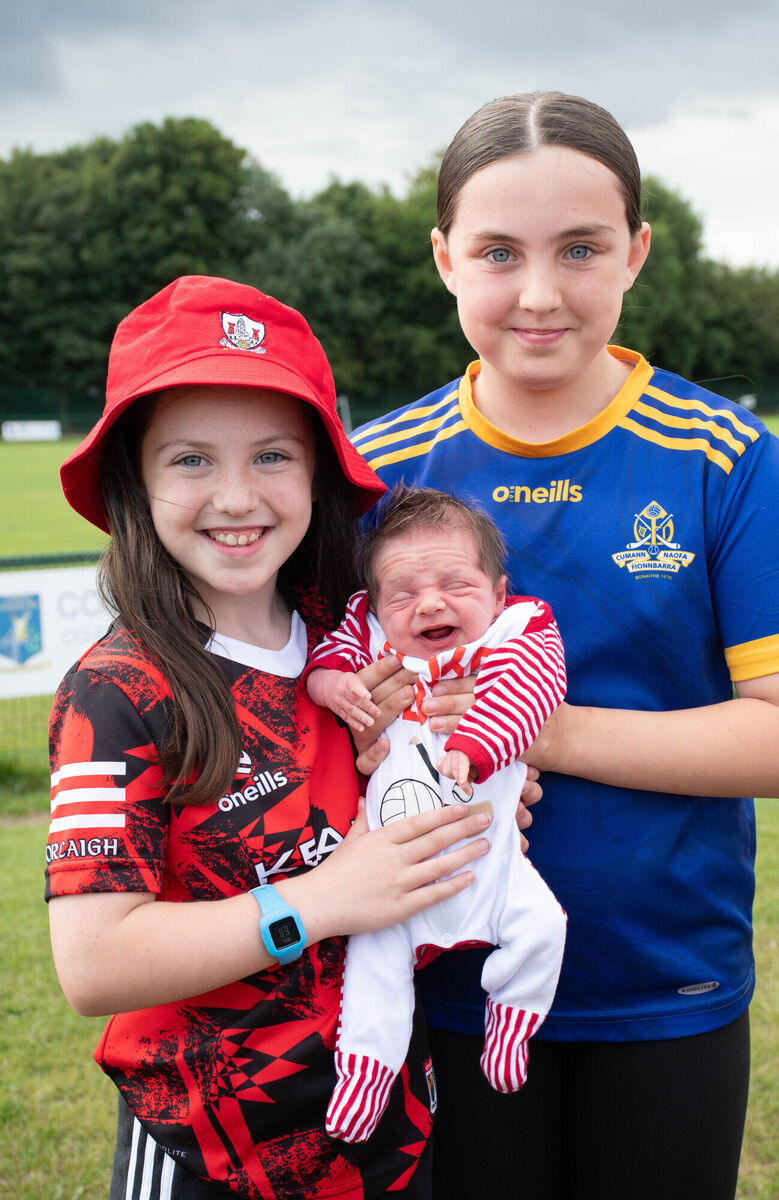 Cork's youngest supporter Rio O'Sullivan Deady pictured with his sisters Manley and Nell at the St Finbarr's GAA Street Leagues. Picture: Howard Crowdy