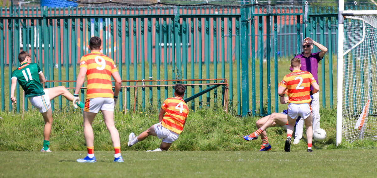 St Michael's Kyle Leahy shoots and scores a goal during the McCarthy Insurance SFL game between St. Michael's and Newcestown at Church Road. Picture: David Creedon