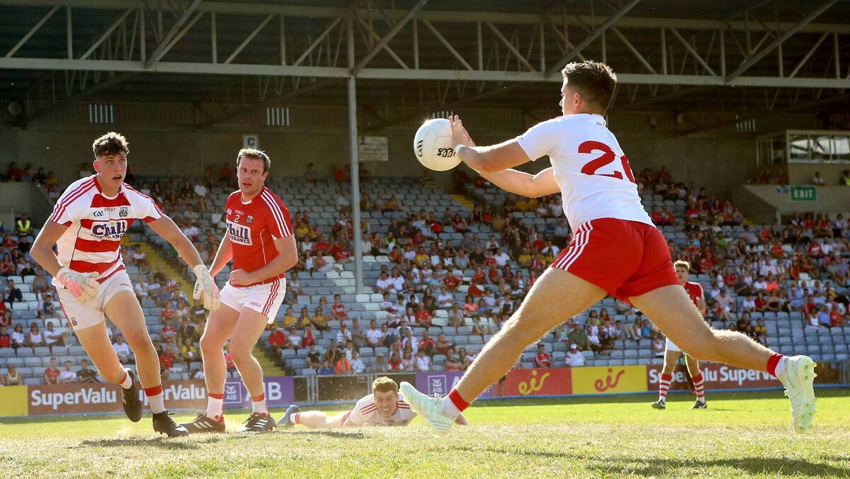 Tyrone's Ronan O'Neill scores his side's second goal despite goalkeeper Mark White of Cork best efforts in 2018. Picture: INPHO/James Crombie