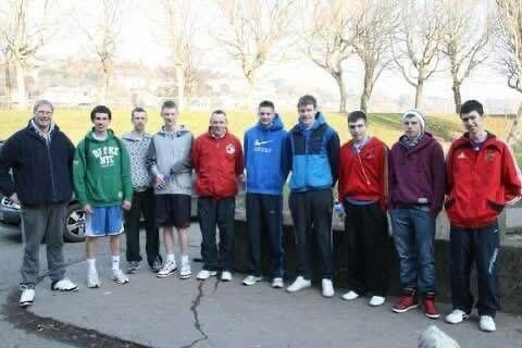 The late Peter Lyall on the left with a group of players that went on a trip to Manchester.
