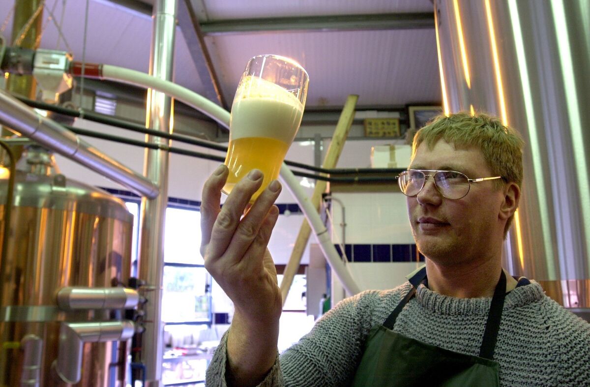 Assistant brewer Peter Lyall examining the quality of the brew at the Franciscan micro brewery on the north Mall.Picture: Richard Mills.