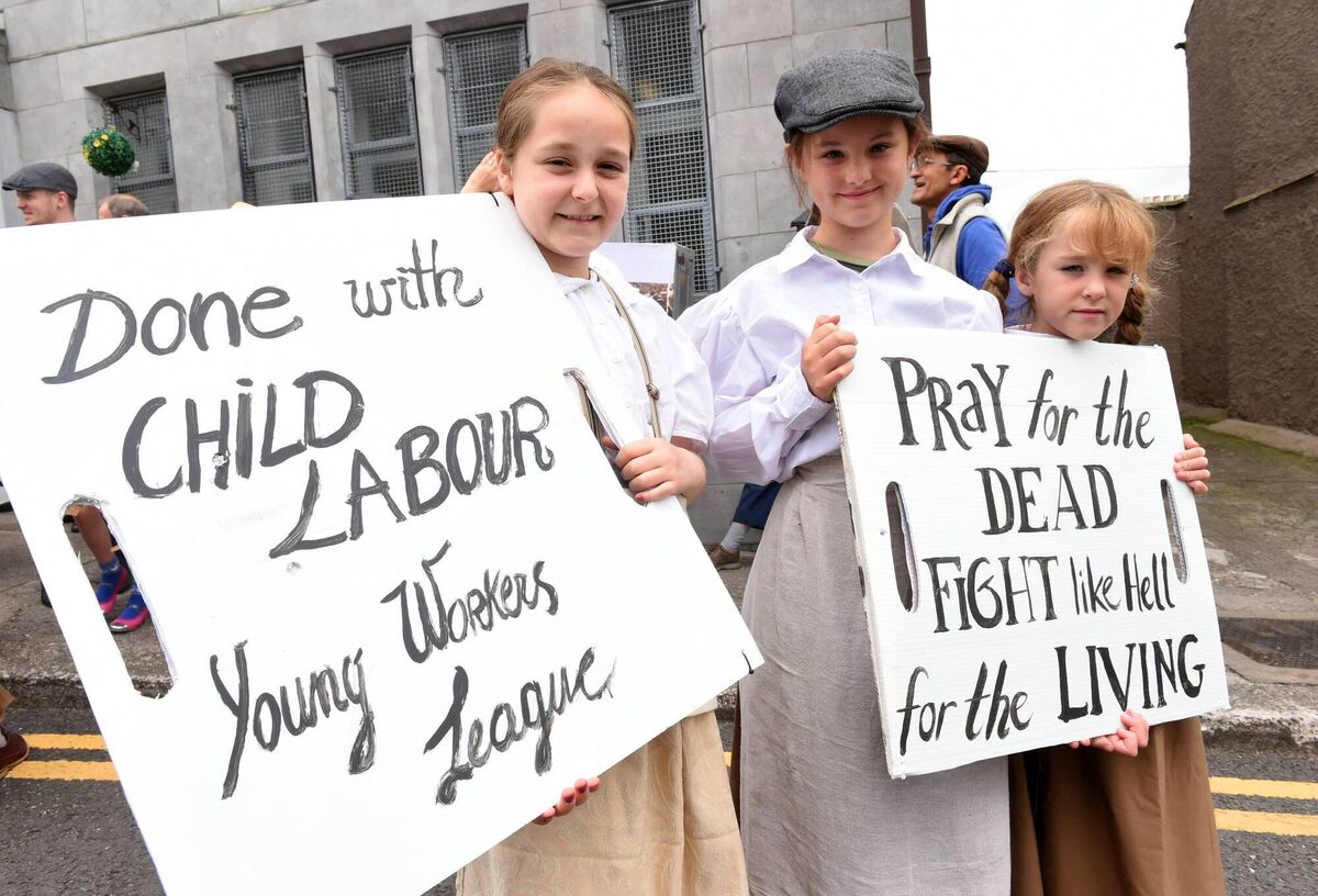 Kate O’Shea and sisters Saibh and Liath McGelligott dressed as child labourers in the Cork Community Artlink and Foróige Group Blarney St staging of a ‘March of the Mill Children’ pageant during the 2019 Spirit of Mother Jones Festival at Shandon. This year’s festival will take place in and around Shandon until Saturday.	Picture: Larry Cummins
                    