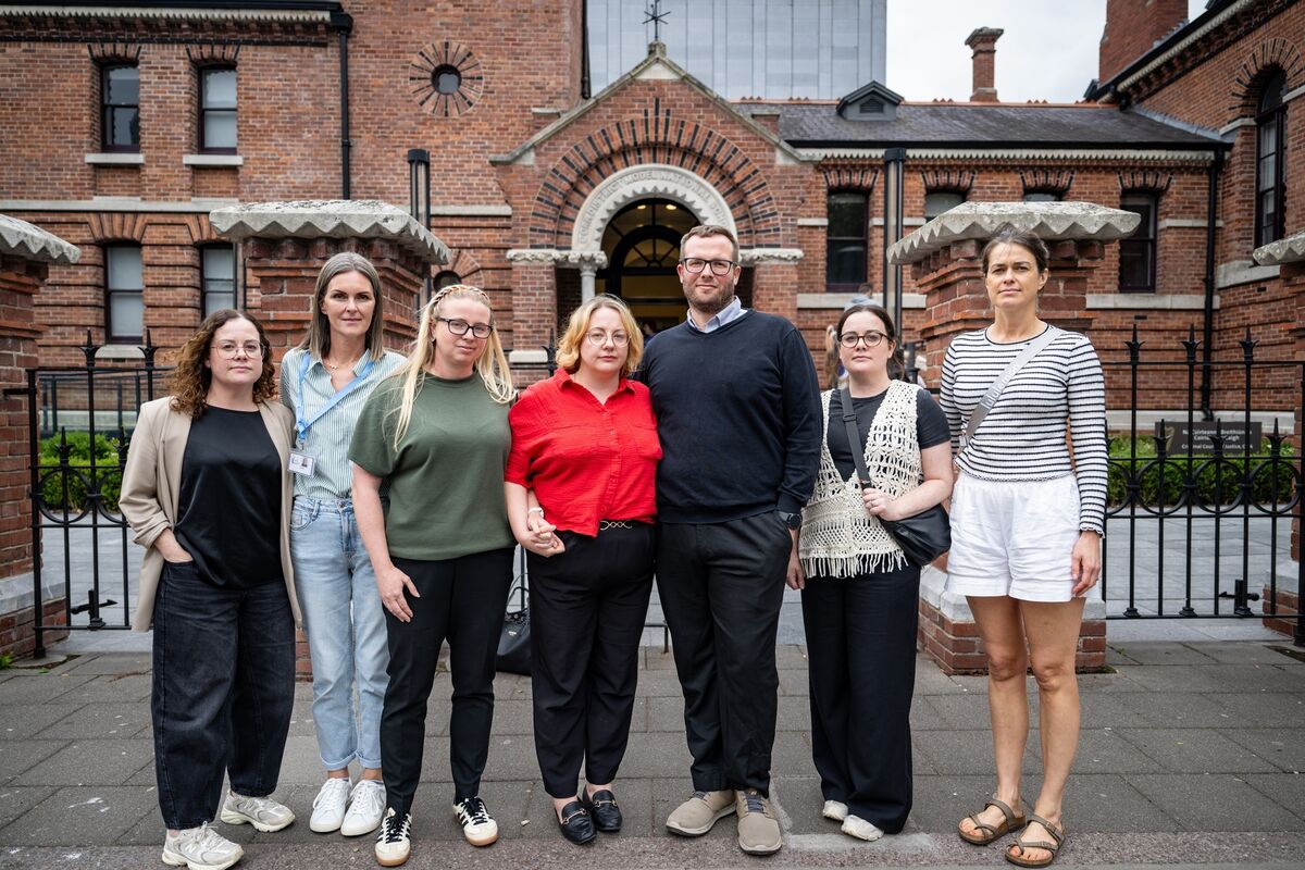 Niamh Herbert pictured with supportive family and friends outside the courthouse on Anglesea Street, Cork City. She has waived her right to anonymity in connection with the rape case involving her brother, Emmett Baylor. Picture Chani Anderson. Niamh Herbert pictured with supportive family and friends outside the courthouse on Anglesea Street, Cork City. She has waived her right to anonymity in connection with the rape case involving her brother, Emmett Baylor. Picture Chani Anderson.