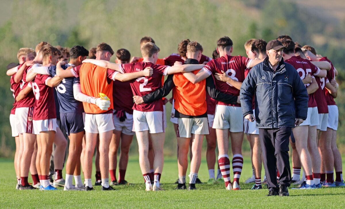 Cork football legend Larry Tompkins, Bishopstown selector, leaves the huddle after speaking to his players prior to the start of the game against Éire Óg. Picture: Jim Coughlan
