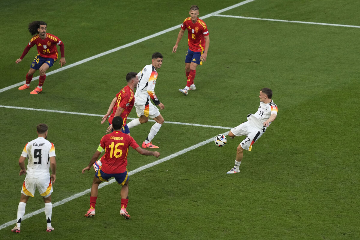 Germany's Florian Wirtz, right, scores his side's first goal during a quarter final match against Spain at the Euro 2024 soccer tournament in Stuttgart, Germany, Picture: AP Photo/Michael Probst Germany's Florian Wirtz, right, scores his side's first goal during a quarter final match against Spain at the Euro 2024 soccer tournament in Stuttgart, Germany, Picture: AP Photo/Michael Probst