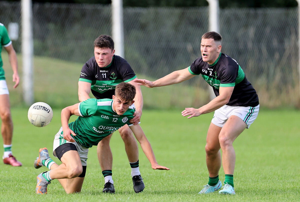  Mark Cronin and Kevin O'Donovan of Nemo Rangers put the pressure on Ben O'Connell of Ballincollig. Picture: Jim Coughlan