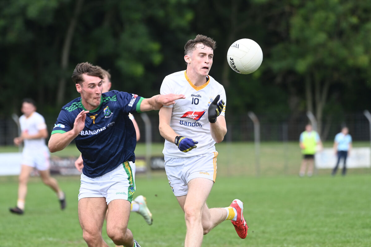  Jack Calnan, Bandon, is tackled by Darragh Murray, Glanmire. Picture Larry Cummins