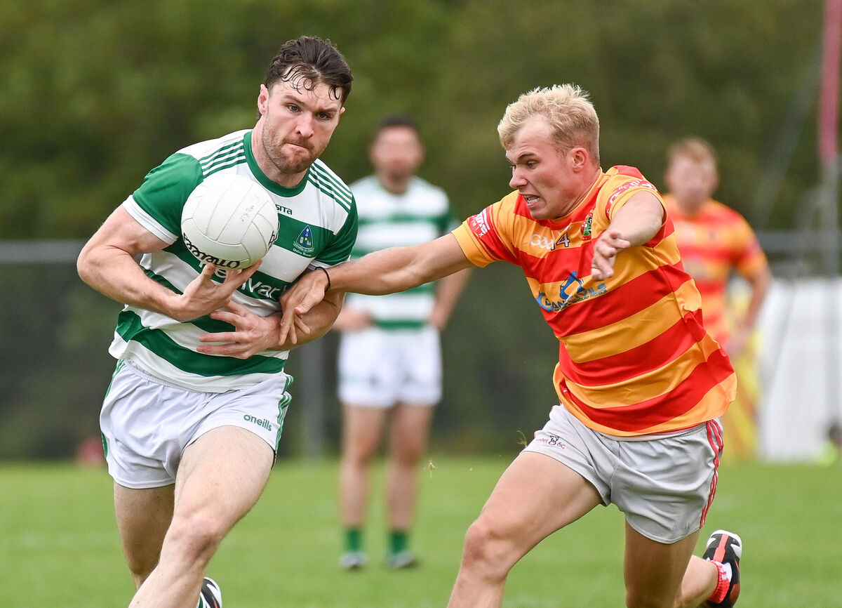 Chris O'Leary of Valley Rovers looks to hold possession as Newcestown's Richard O'Sullivan applies pressure. Picture: David Keane Chris O'Leary of Valley Rovers looks to hold possession as Newcestown's Richard O'Sullivan applies pressure. Picture: David Keane
