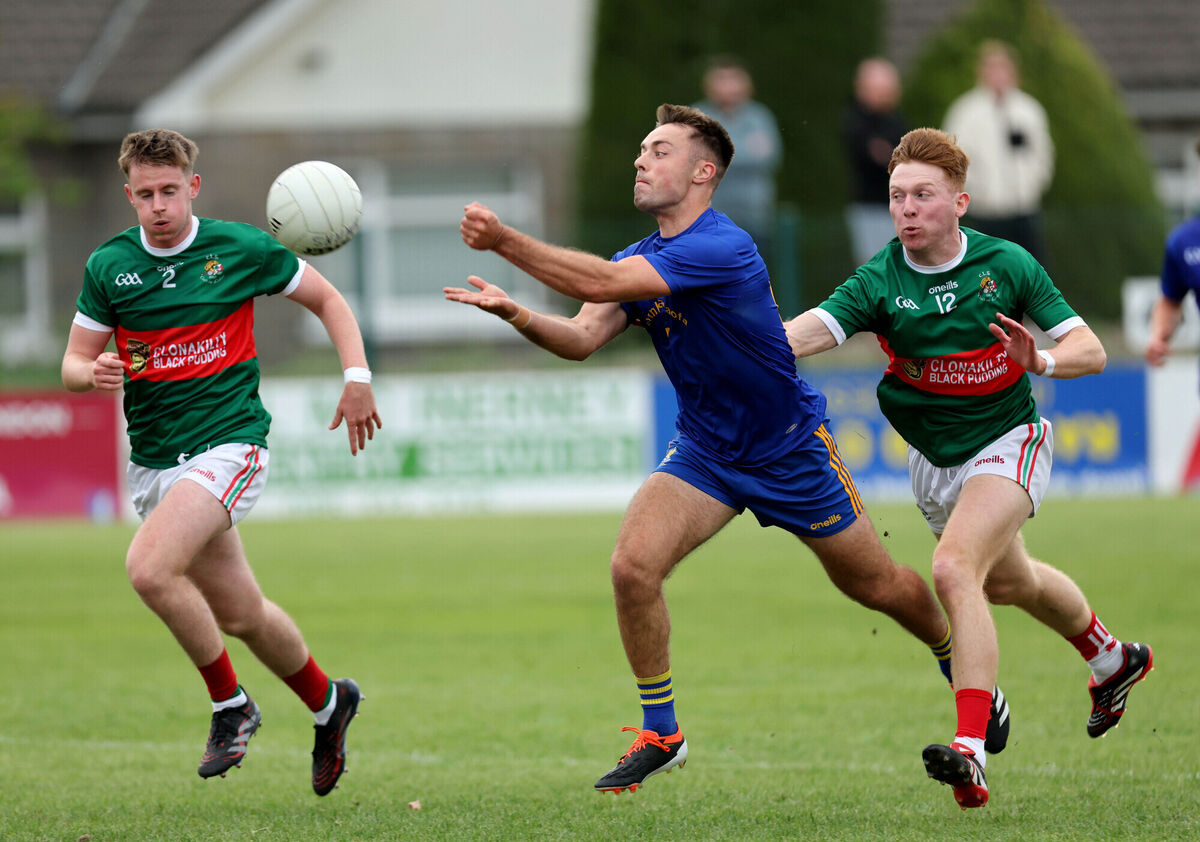 William Buckley of St Finbarr's goes past Chris Kenneally and Ross Mannix of Clonakilty. Picture: Jim Coughlan William Buckley of St Finbarr's goes past Chris Kenneally and Ross Mannix of Clonakilty. Picture: Jim Coughlan