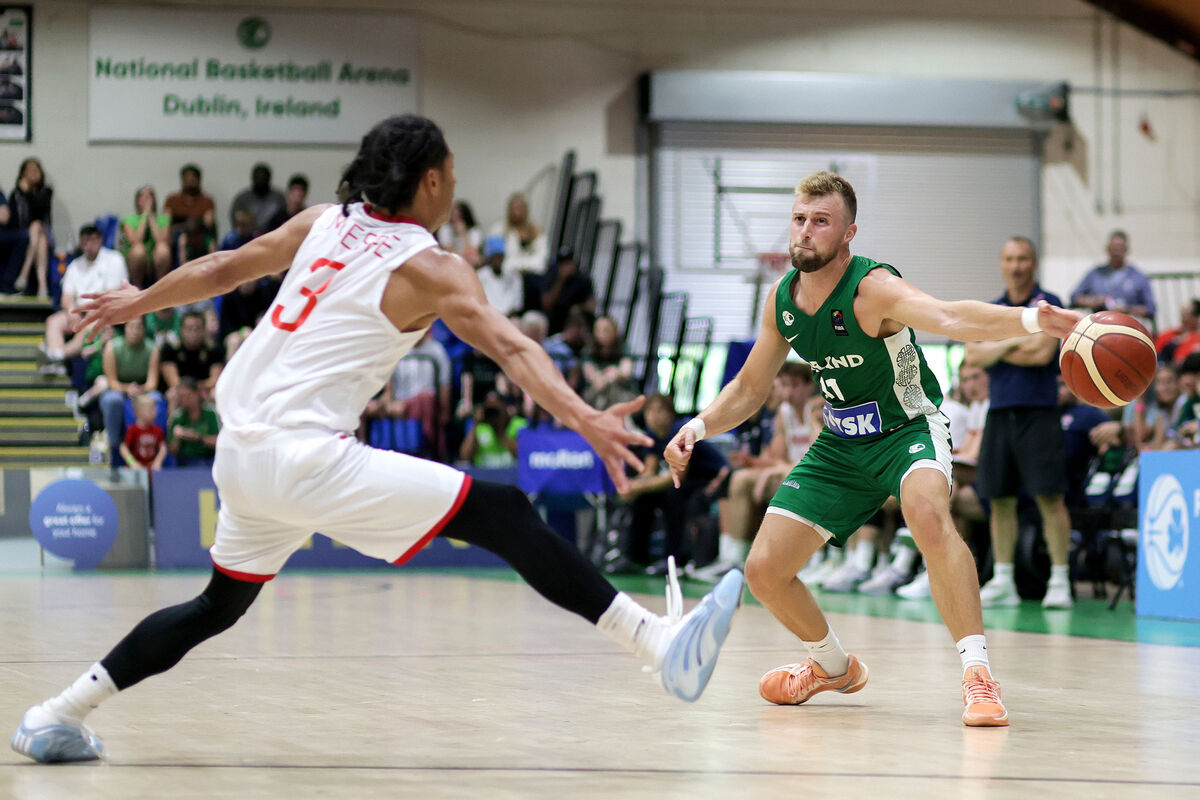 Ireland's Sean Flood and Lars Mensah Espe of Norway. Picture: INPHO/Laszlo Geczo