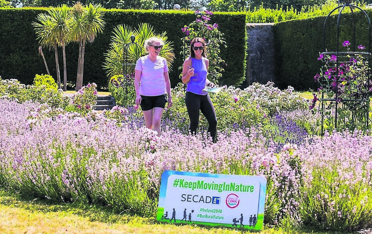 ABOVE: SECAD’s Elga Ryan (right) showcases the newly- added Fota House, Arboretum &amp; Gardens trails with Catriona Harrington, bringing the Keep Moving in Nature guide to life for locals and visitors alike. Picture:: Peter P Photos