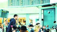 Passengers waiting in departures