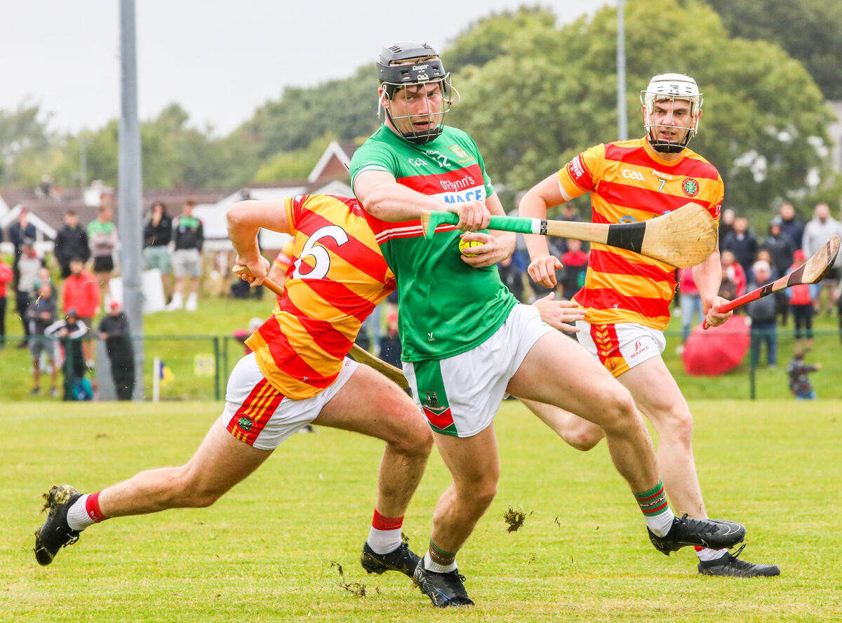 Fr O'Neill's player Peter Hassett in action against Newcestown last year - both are recent SAHC winners. Picture: David Creedon