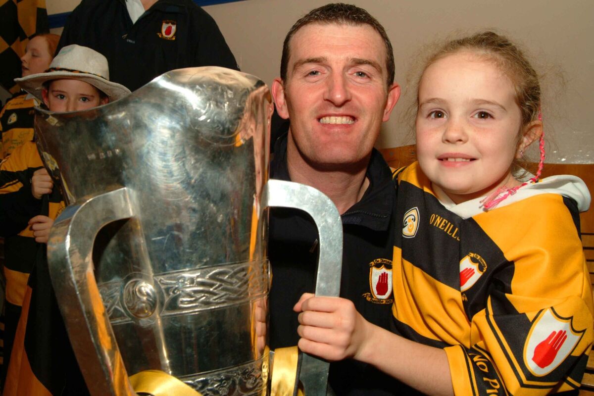 Christy Connery with his daughter Laura after Na Piarsaigh won the Cork SHC in 2004. Picture: Larry Cummins