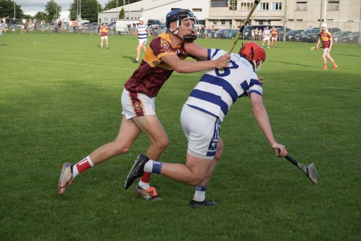 Finn Colman from Youghal tackles Colm Herlihy. Picture: Noel Sweeney