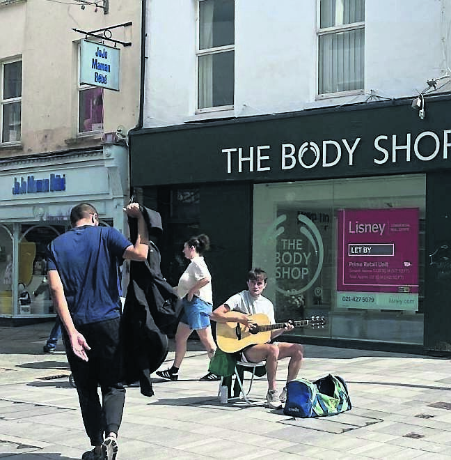 Cialan O’Sullivan entertaining passers-by in the city centre. Cialan O’Sullivan entertaining passers-by in the city centre.