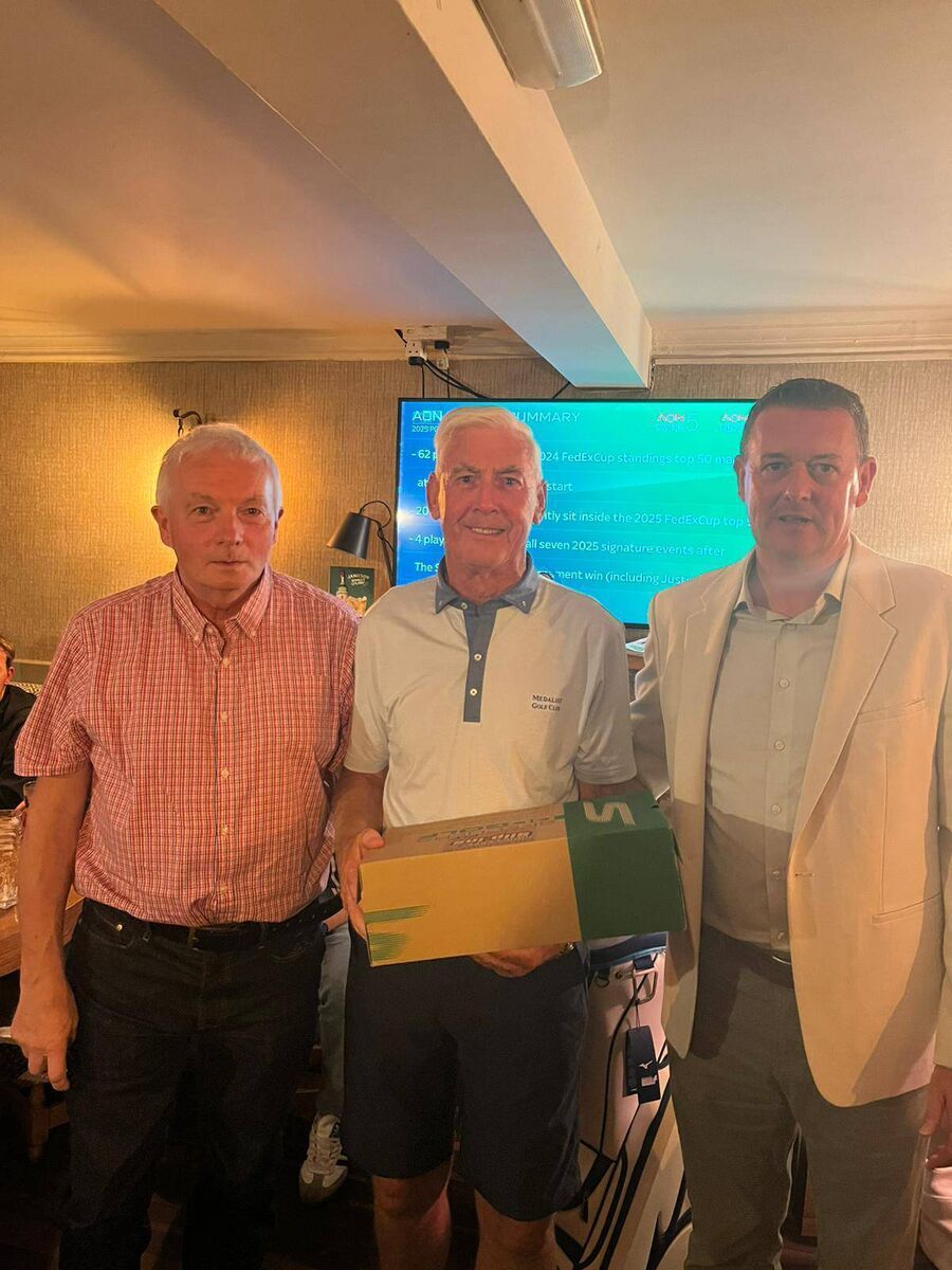 Barry Murphy (centre), the winner of the 'nearest the pin' prize at the Rochestown GAA Club Golf Classic with club chairperson Michael Corkery (left) and Declan Murphy.